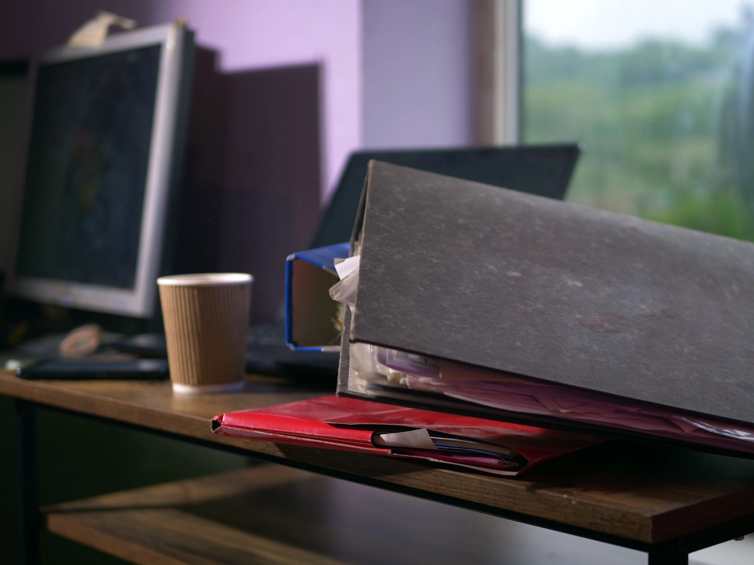 Office desk with accounting documents and files
